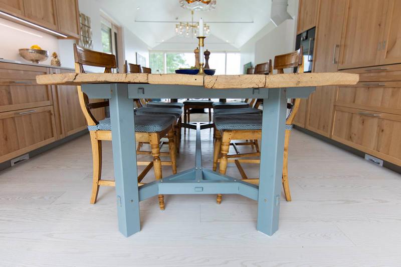 A low view of a beautifully handcrafted kitchen table.
